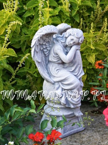  Garden figure of a dreaming angel on a pedestal