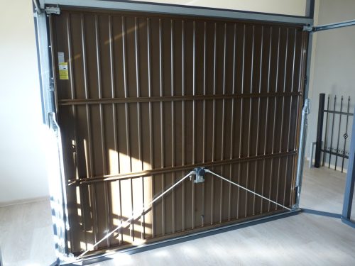 Doors and Gates Legbud Gargula Futuro tilting garage door