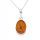  Silver pendant with amber. DELICATE OVAL FILM silver pendant.